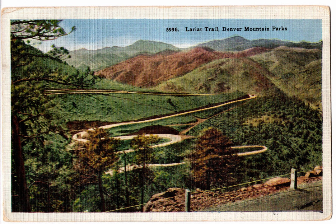 Vintage postcard of a scenic view with a trail and mountains, labeled 'Lariat Trail, Denver Mountain Parks'.