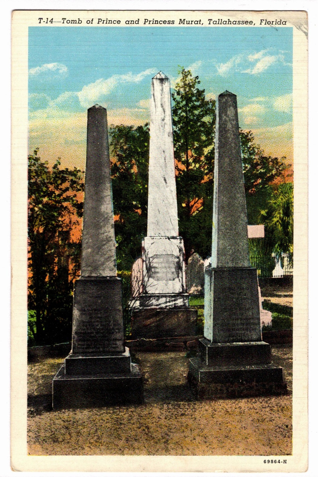 Tomb of Prince and Princess Muriel in Tallahassee, Florida, with obelisks and trees in the background.