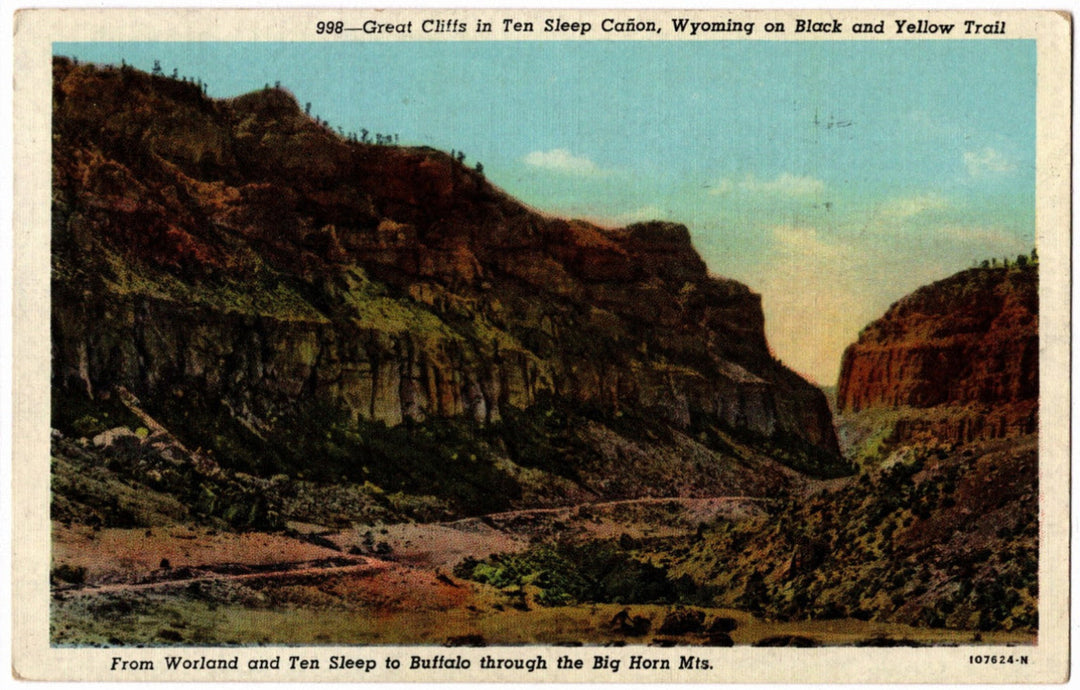 Vintage postcard of Great Cliffs in Ten Sleep Canyon, Wyoming with a scenic view of cliffs and valley.