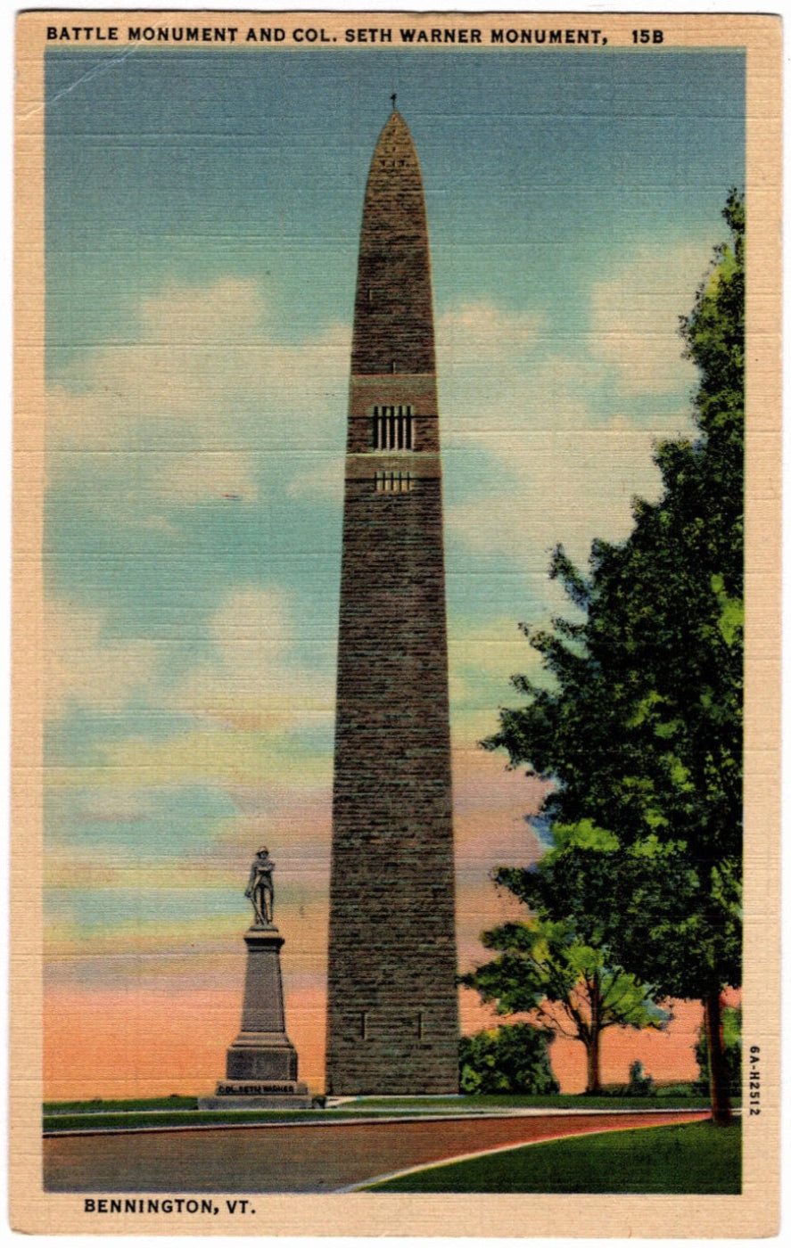 Vintage postcard of a tall monument with a statue at the base, set against a blue sky with clouds.