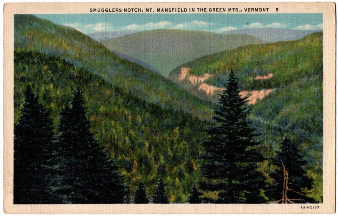Vintage postcard of Smuggler's Notch in Green Mountains with trees and a clear sky.