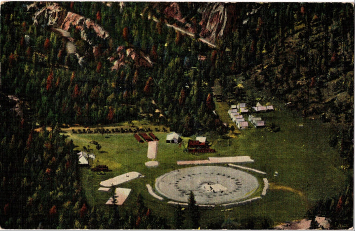 Vintage illustration of a scenic area with a fountain, trees, and buildings.