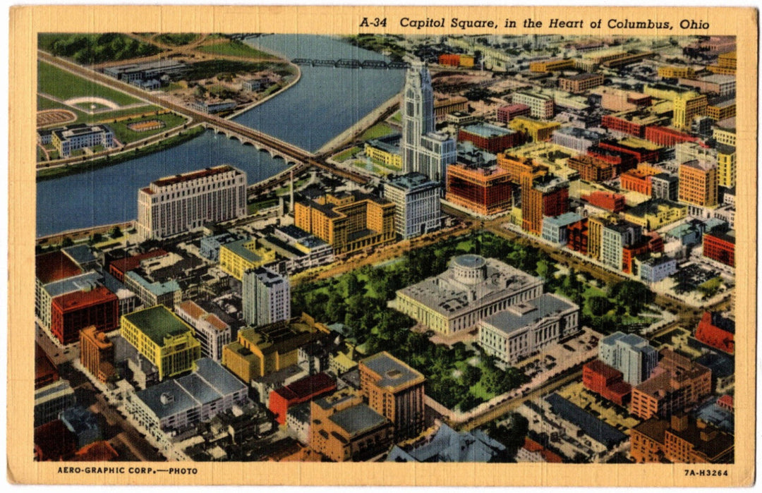 Vintage aerial view of Capitol Square in Columbus, Ohio on a wooden postcard.