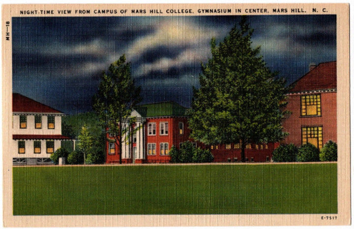 Vintage postcard of a night view from Mars Hill College's campus with the gymnasium in the center.