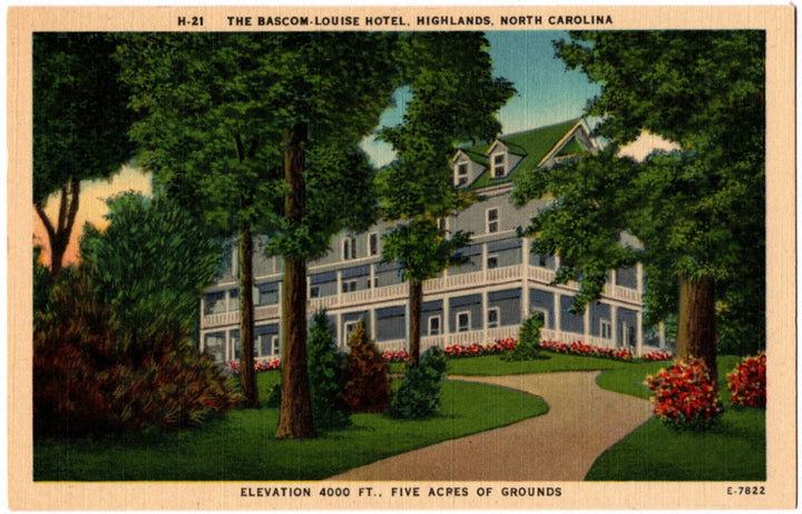 Vintage postcard of The Bascom Louise Hotel in Highlands, North Carolina with trees and flowers.