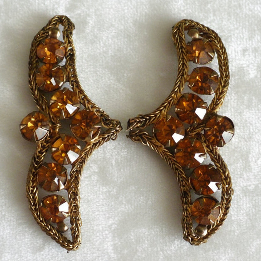 A pair of vintage bronze bullion appliques with topaz rhinestone embellishments.