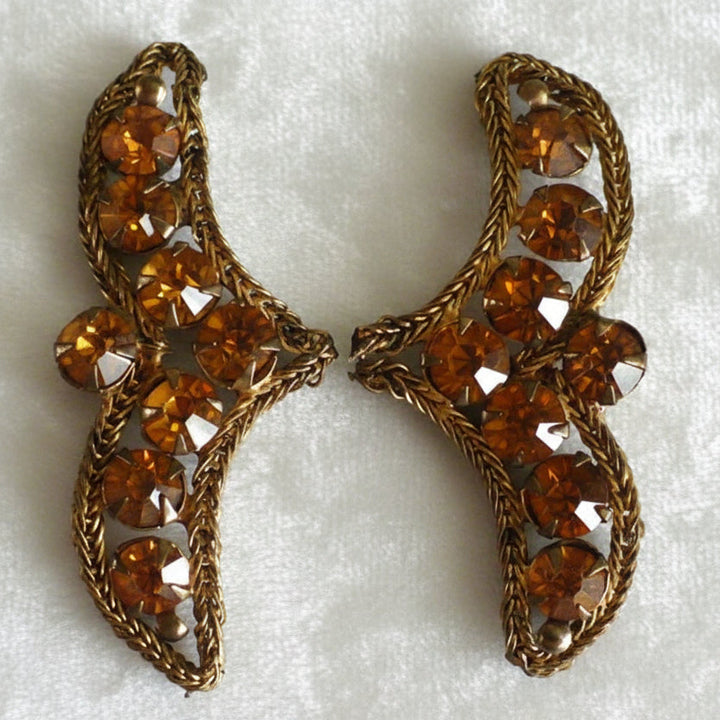 A pair of vintage bronze bullion appliques with topaz rhinestone embellishments.