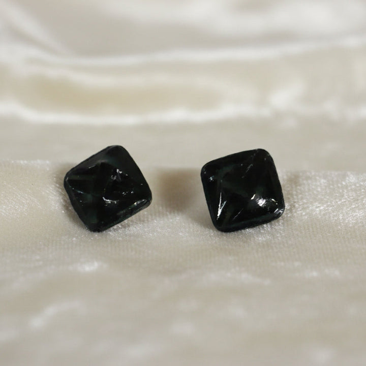 Produced in the Jablonec area of the Czech Republic starting in the 1800s and continuing into the 20th century. Set of two black glass mourning, self-shank buttons with contrasting painted details.
Measure approximately 13 lignes, 8.2 mm., or 5/16".