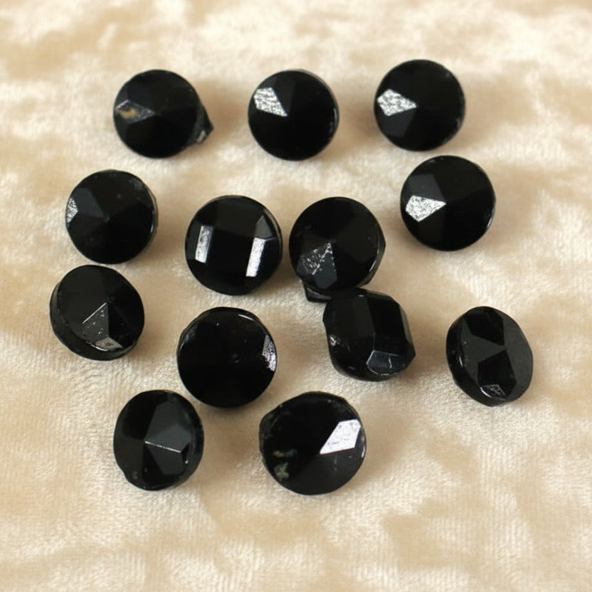 Set of thirteen round, faceted black molded glass diminutive shank buttons. 1910s vintage sewing supply. 5/16"