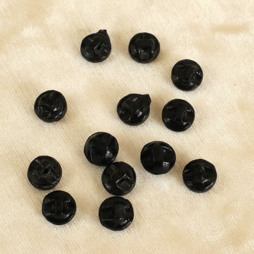 Set of thirteen round, faceted black molded glass diminutive shank buttons. 1910s vintage sewing supply. 5/16"