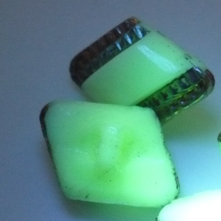 25L Set of Four 1920s–30s Czech Uranium Milk Glass Buttons, 5/8".