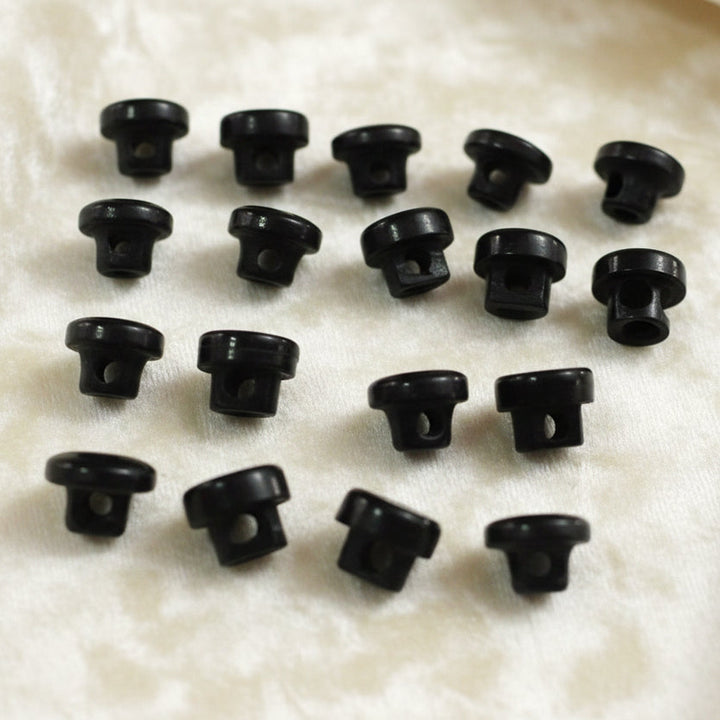 Set of sixteen black glass diminutive buttons. Circa 1800s Victorian mourning, vintage sewing supply.