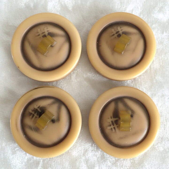 Vintage late 1940s to 1950s Brutalist celluloid coat buttons – set of four.