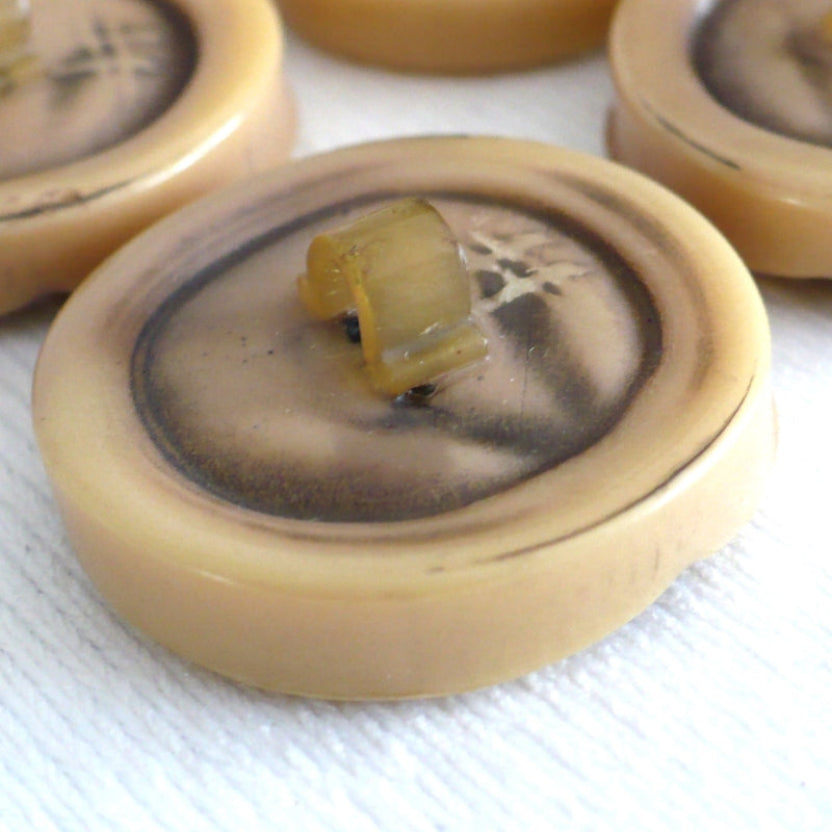 Vintage late 1940s to 1950s Brutalist celluloid coat buttons – set of four.