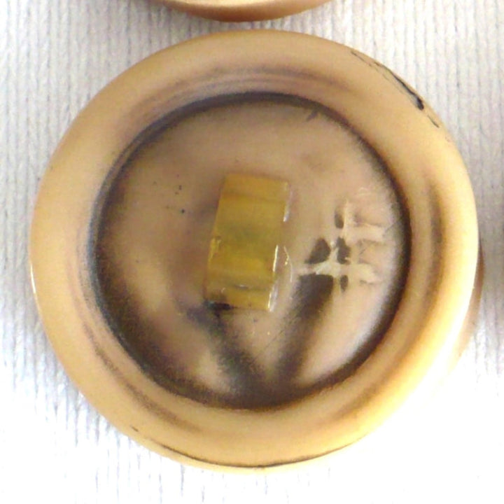 Vintage late 1940s to 1950s Brutalist celluloid coat buttons – set of four.