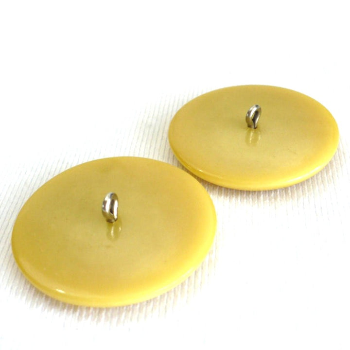 69L Set of Two Mid Century Mustard Yellow Coat Shank Buttons 1 3/4"
