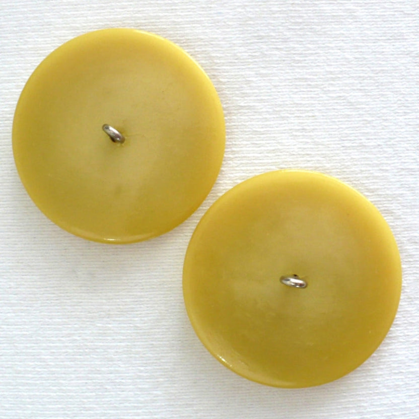 69L Set of Two Mid Century Mustard Yellow Coat Buttons 1 3/4".