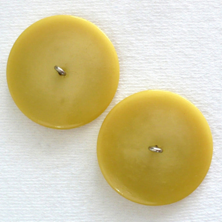 69L Set of Two Mid Century Mustard Yellow Coat Buttons 1 3/4".