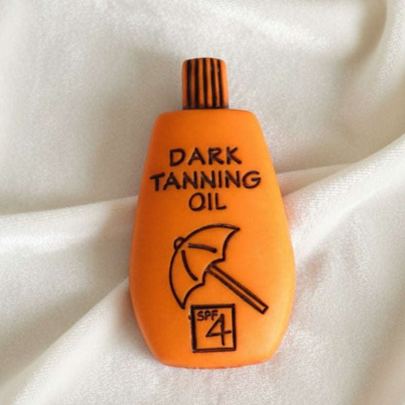 38L Dark Tanning Oil 1970-80s Kiddie Beach Novelty Button 15/16".