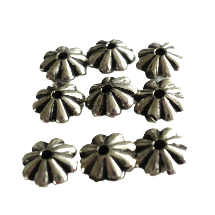 9 - 1960s Vintage 3x6mm Silver Flower Spacer Beads