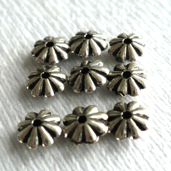 9 - 1960s Vintage 3x6mm Silver Flower Spacer Beads