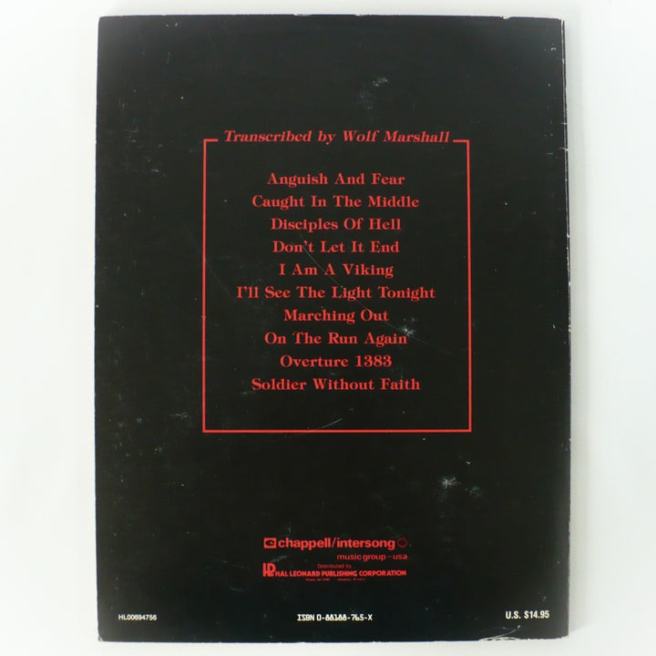 Back cover of 1987 Yngwie Malmsteen Marching Out book showing tracklist and original price.