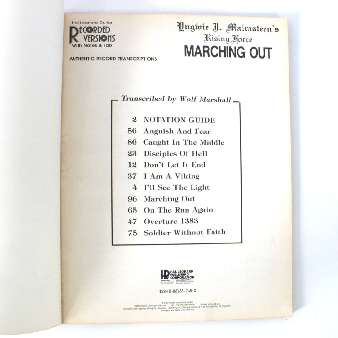 Spine and side profile of 1987 Yngwie Malmsteen Marching Out vintage guitar tablature book.