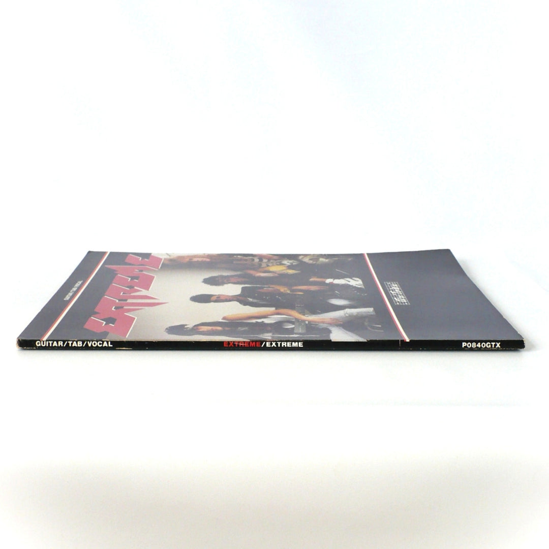 Spine of 1989 Extreme guitar tab book with Ax Trax branding and product code P0840GTX