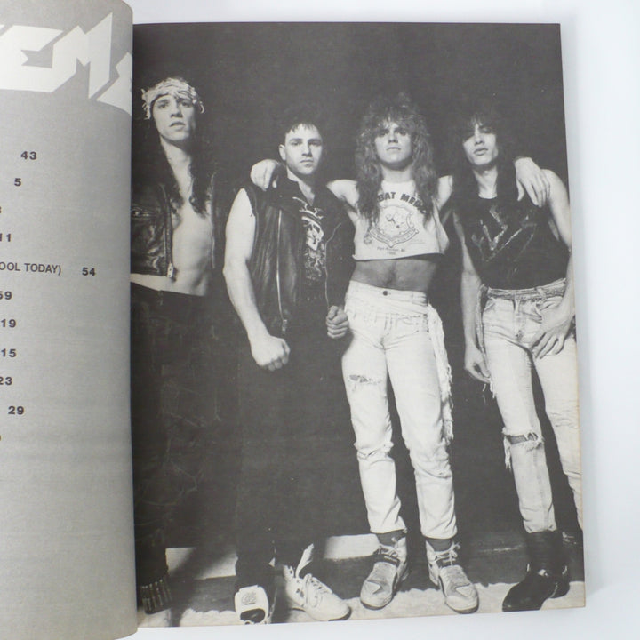 Vintage black and white band photo of Extreme from the 1989 debut guitar tab book, featuring Gary Cherone, Nuno Bettencourt, Pat Badger, and Paul Geary.