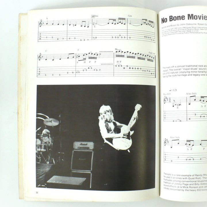Interior page spread of the 1986 Original Randy Rhoads guitar tab book by Wolf Marshall, featuring the notation for "No Bone Movies" and a black-and-white performance photograph of Randy Rhoads.