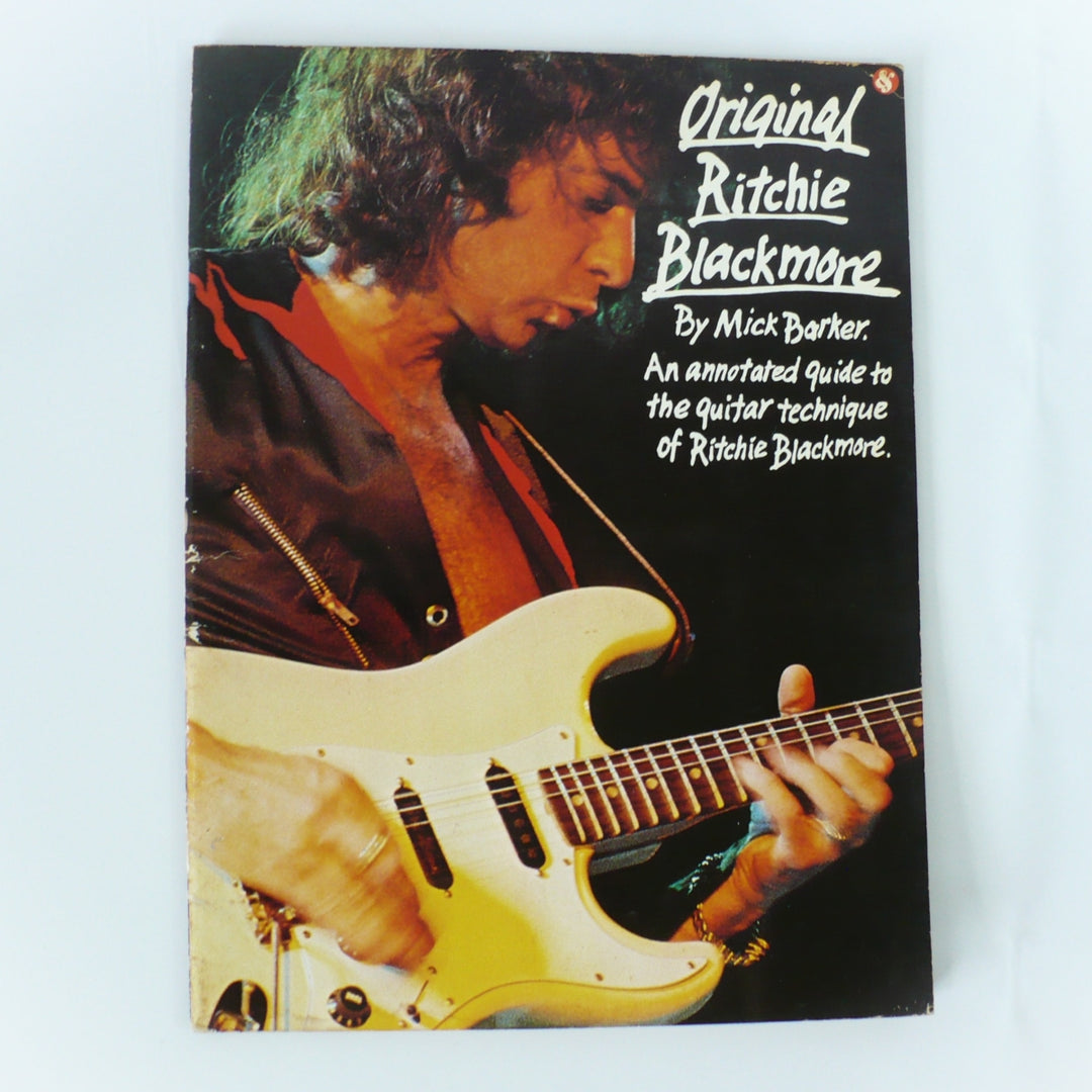 Front cover of 1987 Original Ritchie Blackmore guitar tab book by Mick Barker featuring Ritchie with his signature white Fender Stratocaster.