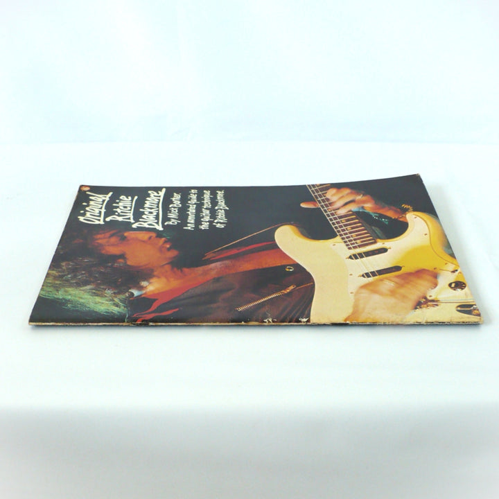 Spine and front cover of the 1987 Original Ritchie Blackmore guitar tab book by Mick Barker, showing the saddle-stitched binding edge and the cover artwork.