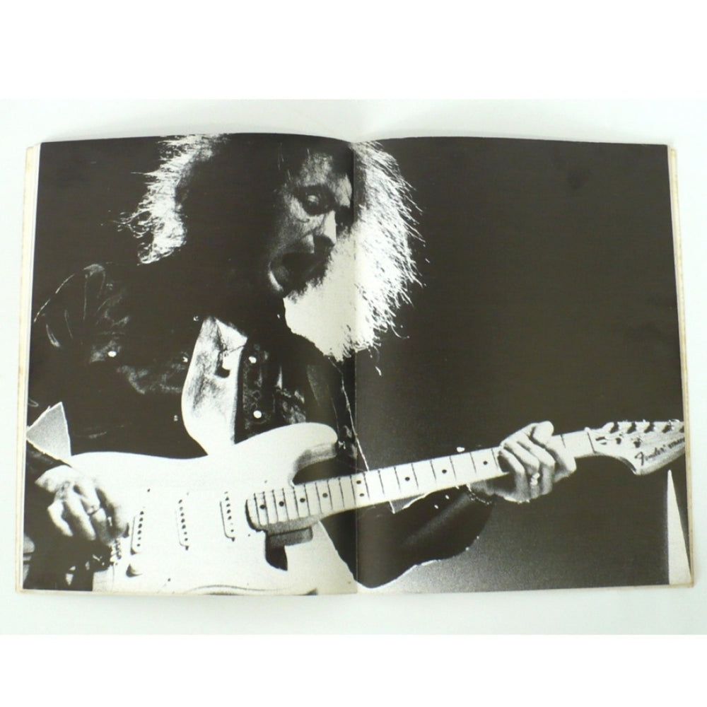 Centerfold photograph of Ritchie Blackmore performing with his Fender Stratocaster, featured in the 1987 "Original Ritchie Blackmore" guitar tab book.