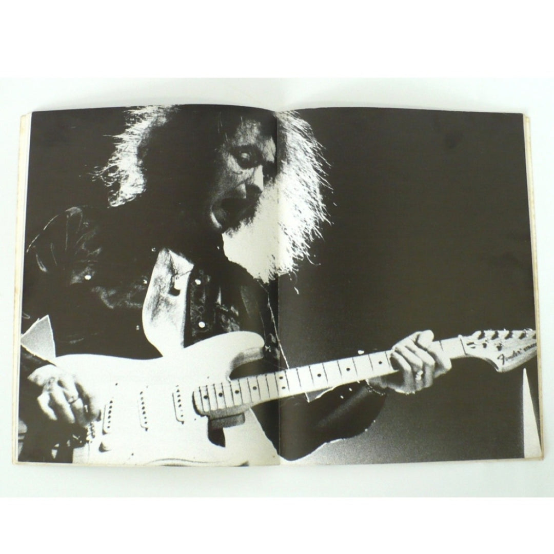 Centerfold photograph of Ritchie Blackmore performing with his Fender Stratocaster, featured in the 1987 "Original Ritchie Blackmore" guitar tab book.