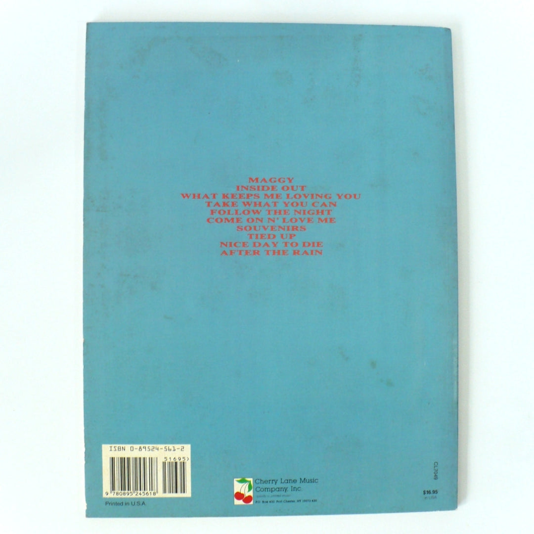 Back cover of the 1990 XYZ band guitar tablature book by Cherry Lane Music, showing the tracklist and ISBN barcode.