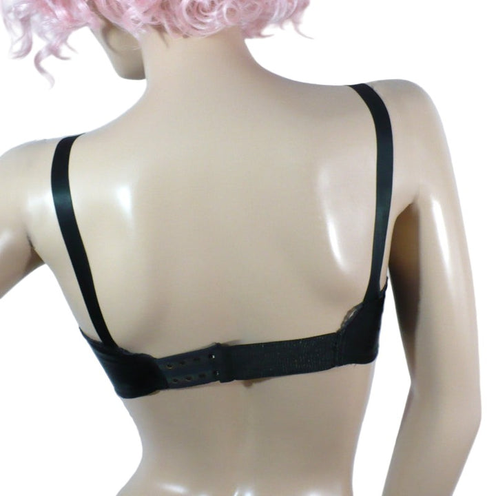Black bra on a mannequin with a white background.