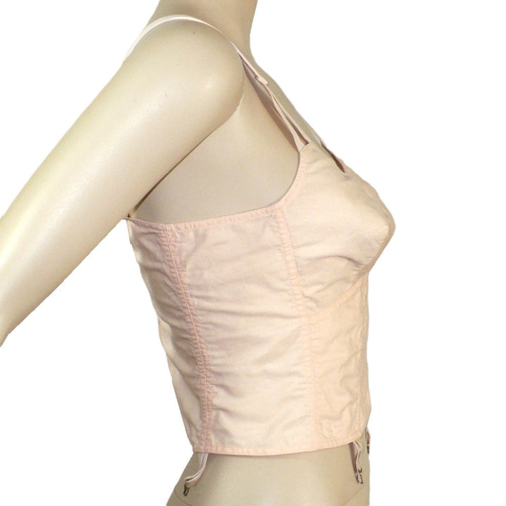 Peach 1940s Full Busted Babe Longline Bra with Girdle Hooks on a mannequin against a white background.
