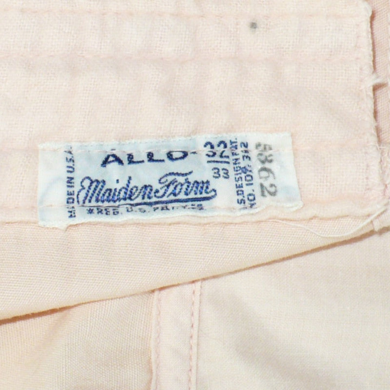 Peach 1940s Full Busted Babe Longline Bra with Girdle Hooks on a mannequin against a white background. label.