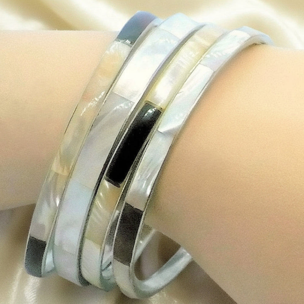 1980 Set of 4 Abalone Shell Bracelet Set on wrist.