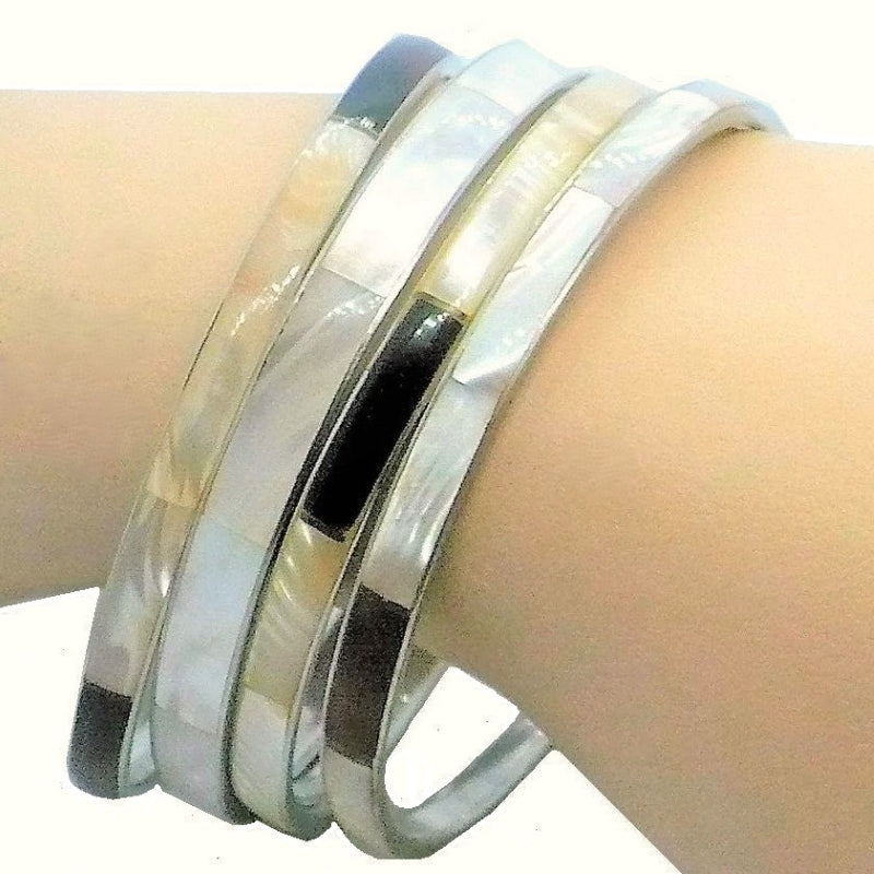 1980 Set of 4 Abalone Shell Bracelet Set on wrist.
