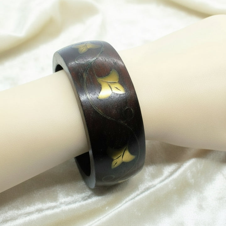 970 Vintage Brass Vine Inlay Teak Bangle Bracelet on wrist.