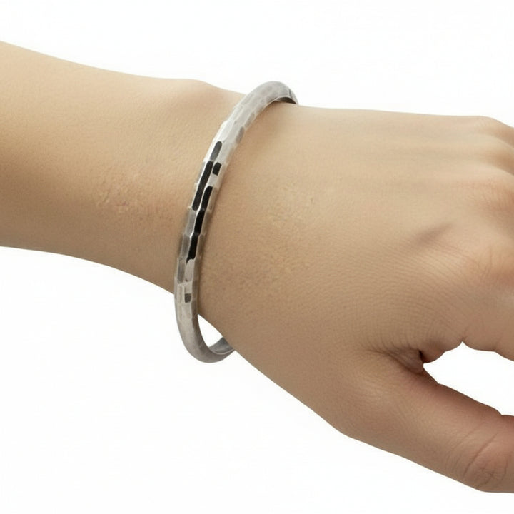 1970 Vintage Sterling Silver Faceted Charnière Hinged Bangle Bracelet on wrist.