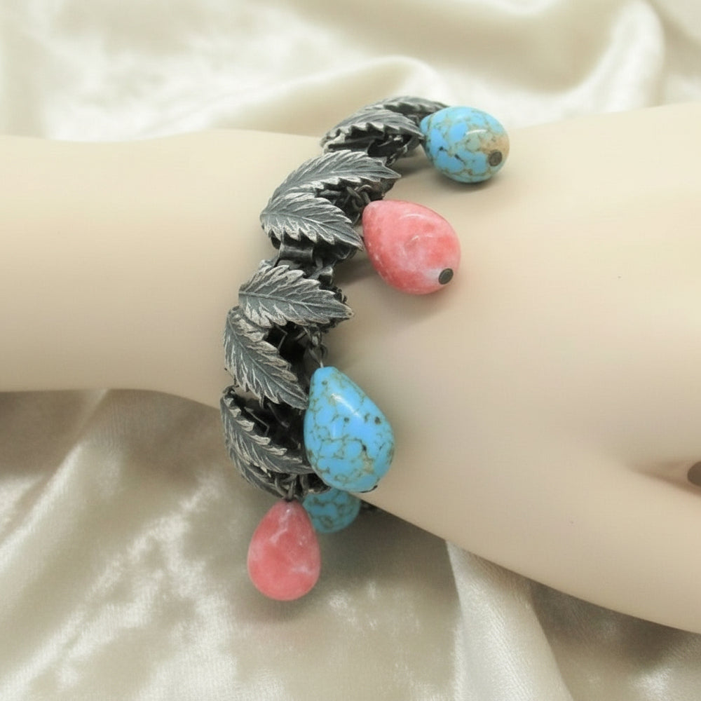 1930s Charm Bracelet with Hubbell Glass Beads, Native American-Inspired, on wrist..