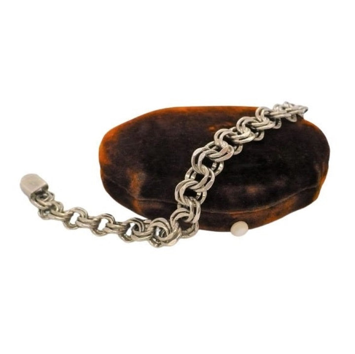 1950 Sterling  silver double link charm chain Lang Bracelet.