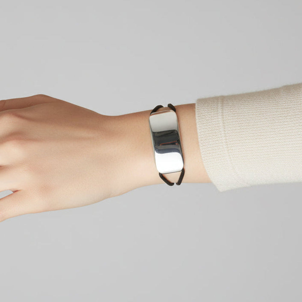 Vintage J. Rivièr Modernist ID Bracelet, 800 Silver & Leather Italy on wrist of model.