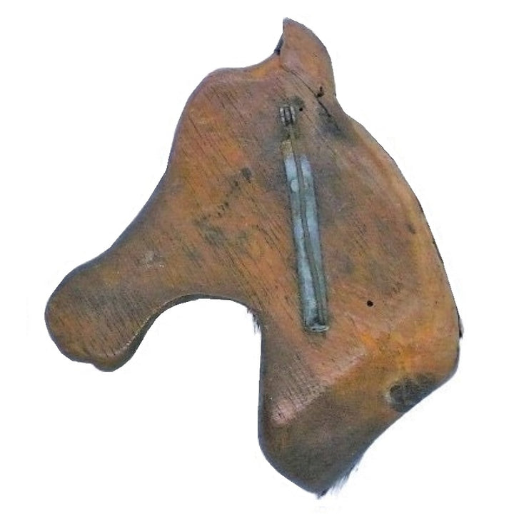 Brooch.