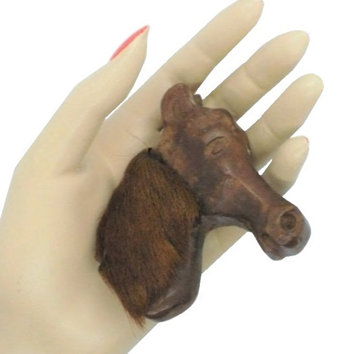 Brooch.