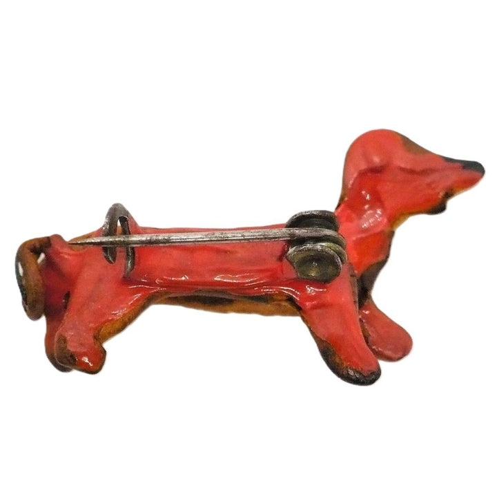 Brooch.