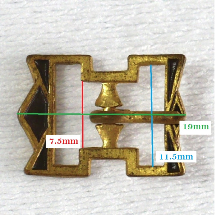 Tiny vintage buckle.