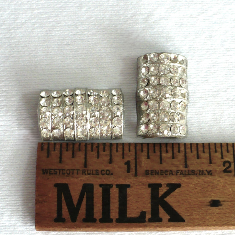 1930s Rhinestone Evening Shoe Strap Ornaments next to a wood ruler for scale.